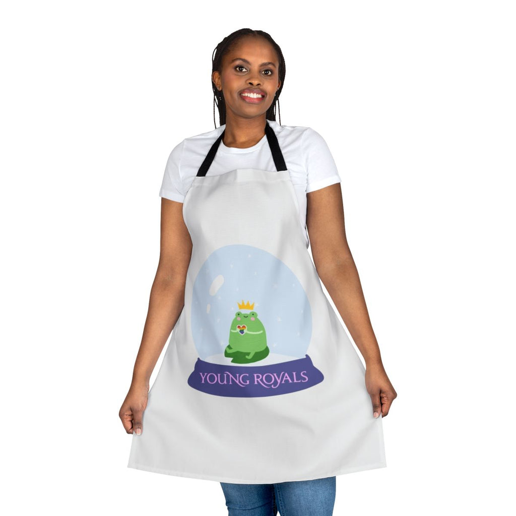 A snow globe-themed apron featuring the characters Wilhelm and Simon from the Swedish drama series Young Royals.