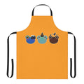 Froggy Hobbies Apron featuring a cartoon design of frogs and various hobbies
