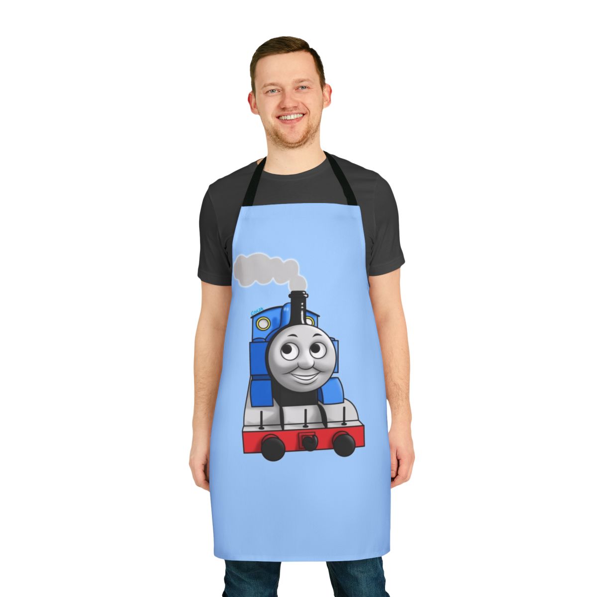 A colorful apron featuring the beloved Thomas the Tank Engine and his railway friends.