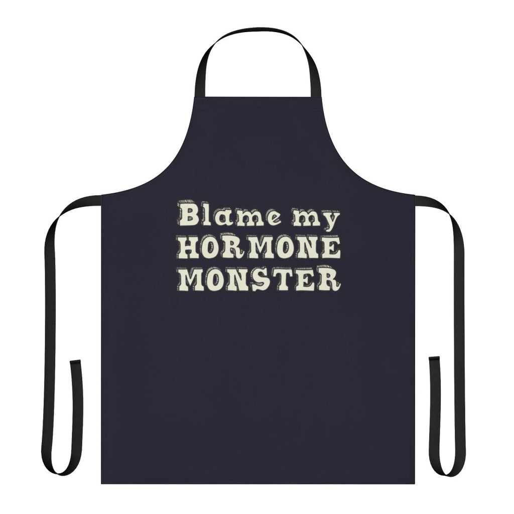 A black apron with an illustration of the Big Mouth hormone monster character from the Netflix animated series.