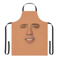 A humorous full-face print of actor Nicolas Cage on a kitchen apron