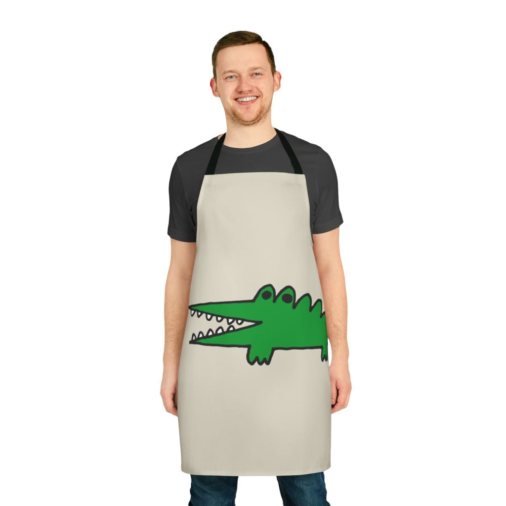 Whimsical apron featuring a cute baby alligator or crocodile character facing big challenges in a vintage-inspired, cartoon-style illustration.