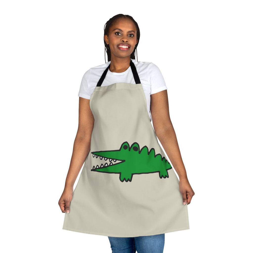 Whimsical apron featuring a cute baby alligator or crocodile character facing big challenges in a vintage-inspired, cartoon-style illustration.