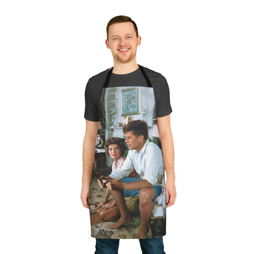 Man wearing an apron with a JFK-inspired "Press F" design
