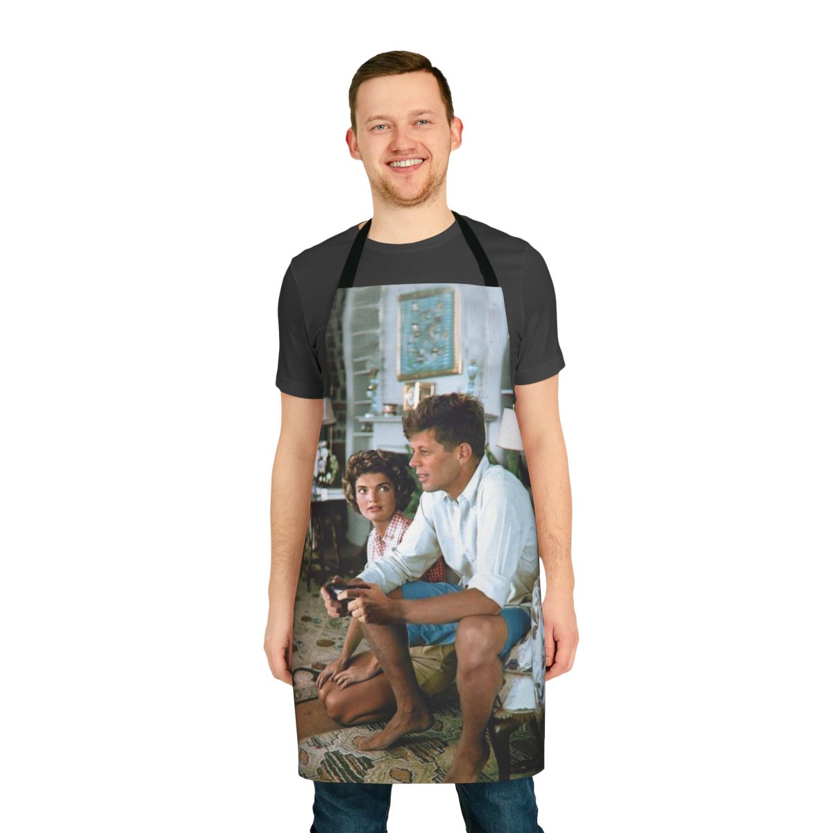 Man wearing an apron with a JFK-inspired "Press F" design