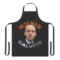 Comical apron with an image of French President Emmanuel Macron and a message about his baldness