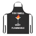 A white apron with the text "You Smell Very Flammable" inspired by the TV show Schitt's Creek.