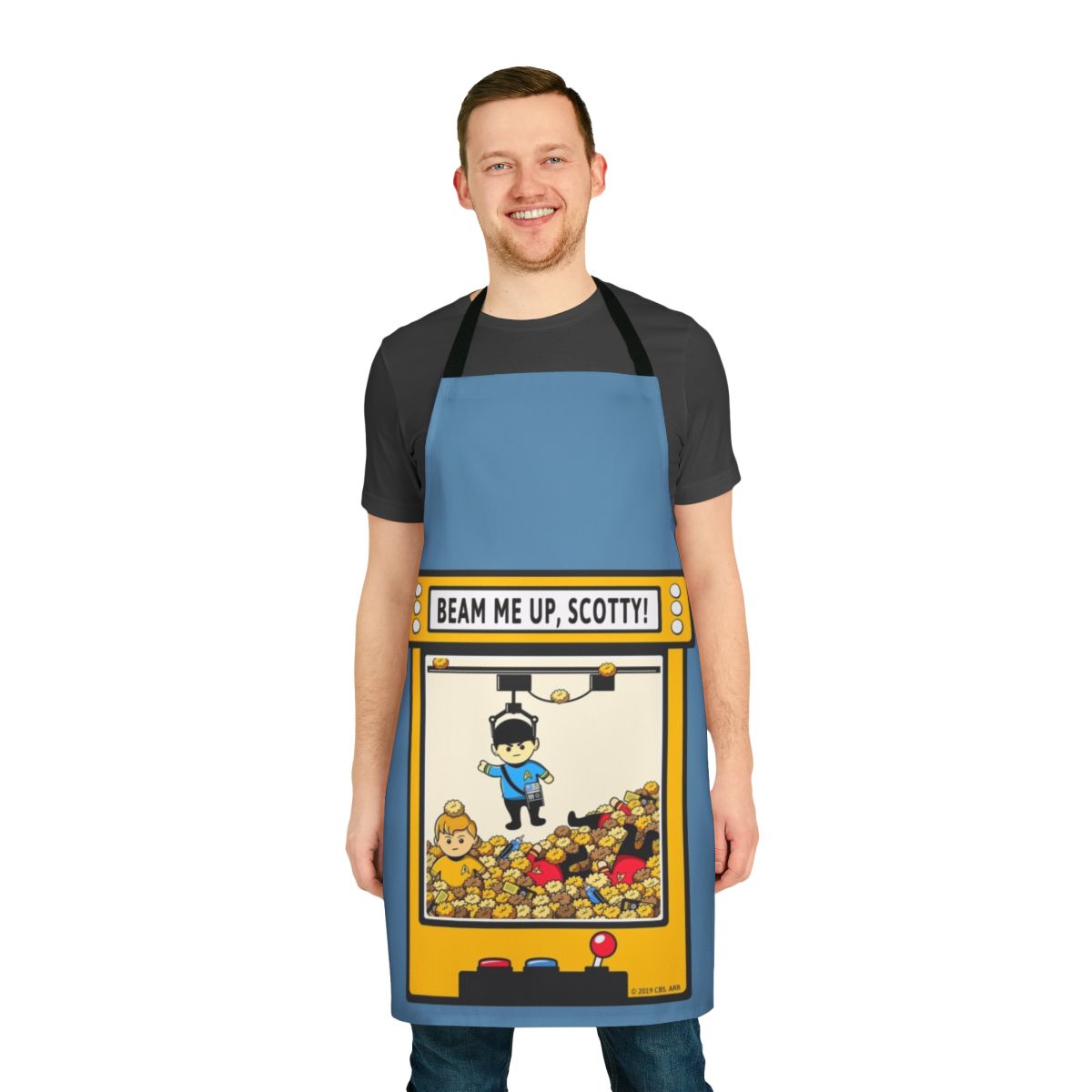 A red apron with a "Beam Me Up Scotty" design, perfect for fans of the original Star Trek series.