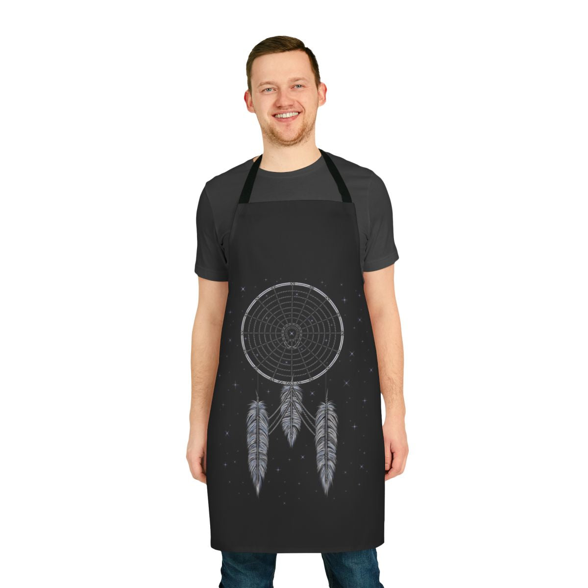 A stylish apron featuring a dream catcher design with stars, spaceships, and a rocket in a sci-fi inspired pattern.