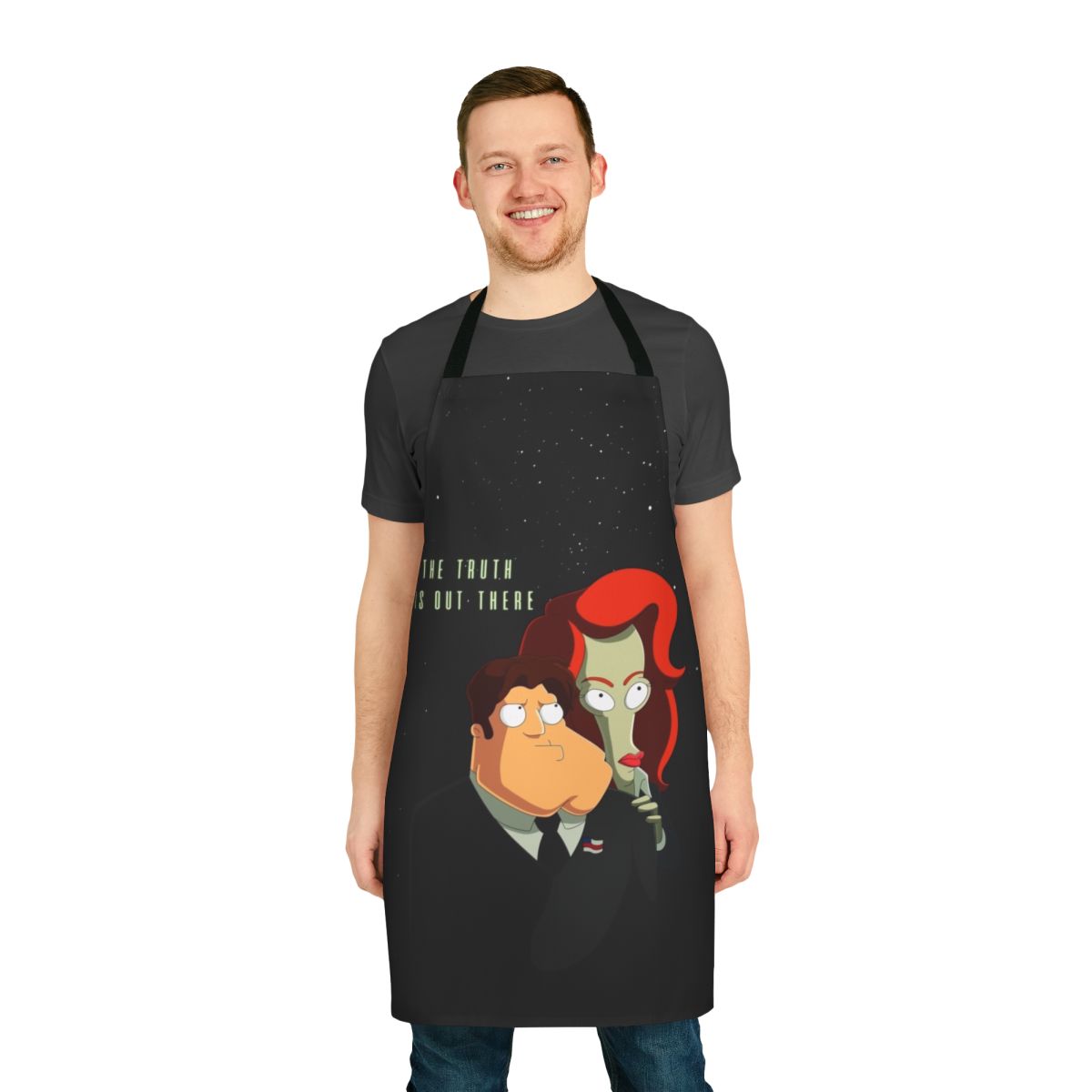 Alien-inspired apron featuring UFO and space imagery for a sci-fi cooking experience