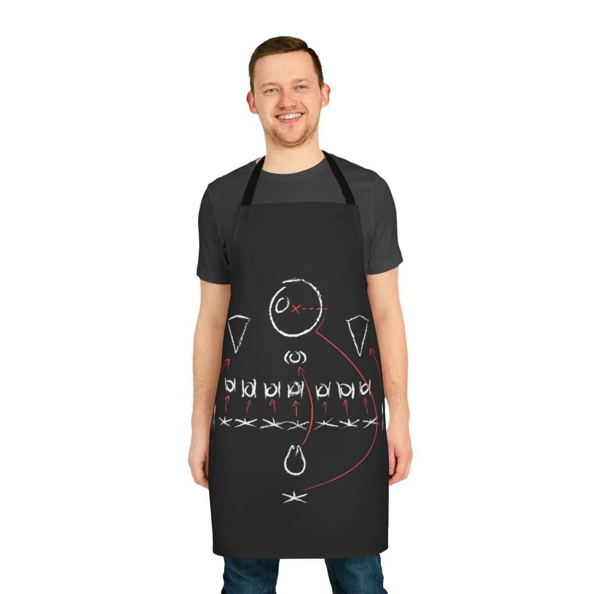 A stylish apron featuring a chalkboard-style diagram of Star Wars and football plays