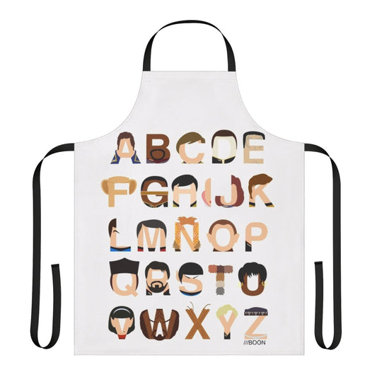 A black apron with a colorful print of the Star Trek alphabet