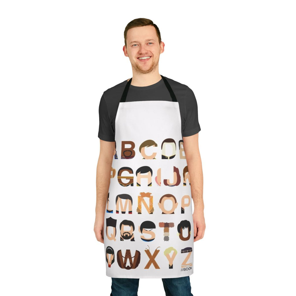 A black apron with a colorful print of the Star Trek alphabet