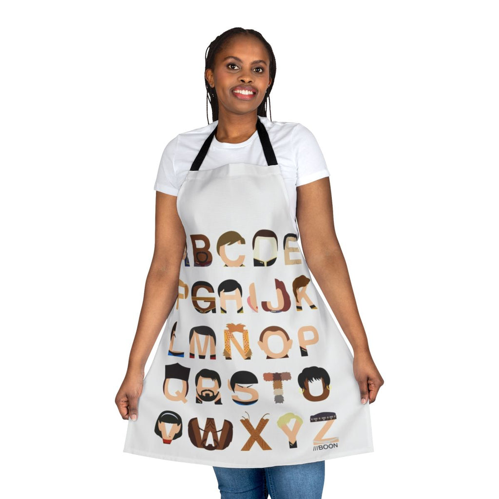 A black apron with a colorful print of the Star Trek alphabet