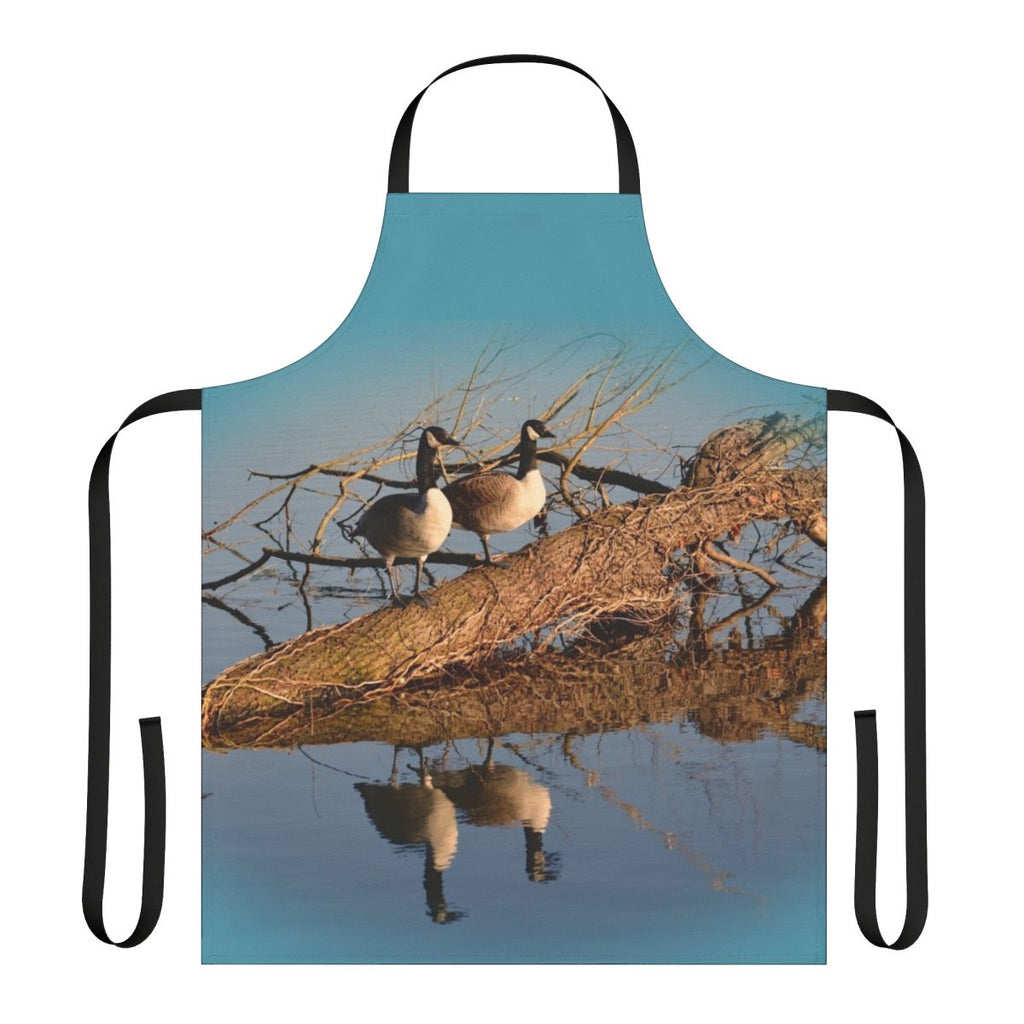 Apron featuring a beautiful image of geese swimming on a tranquil lake