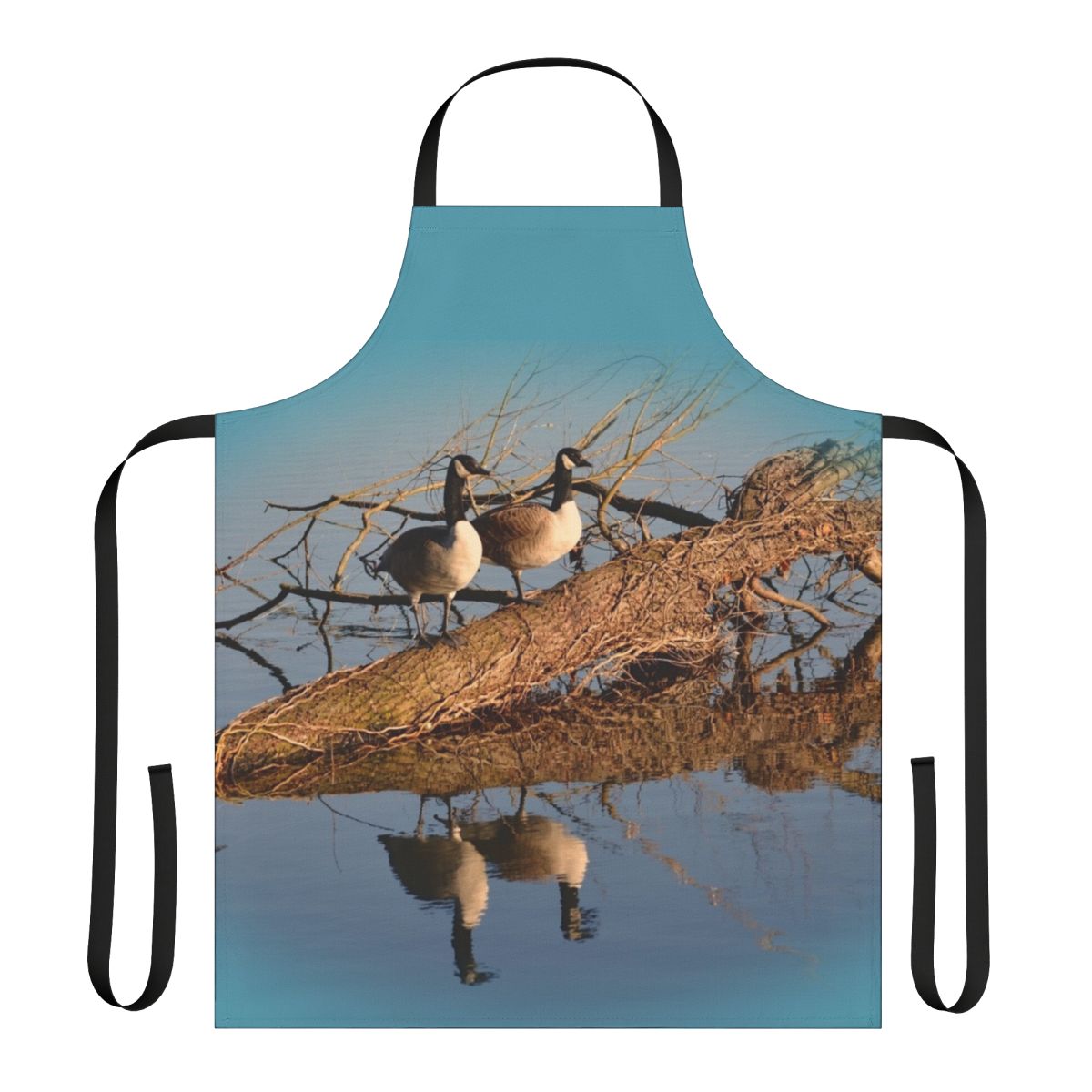 Apron featuring a beautiful image of geese swimming on a tranquil lake