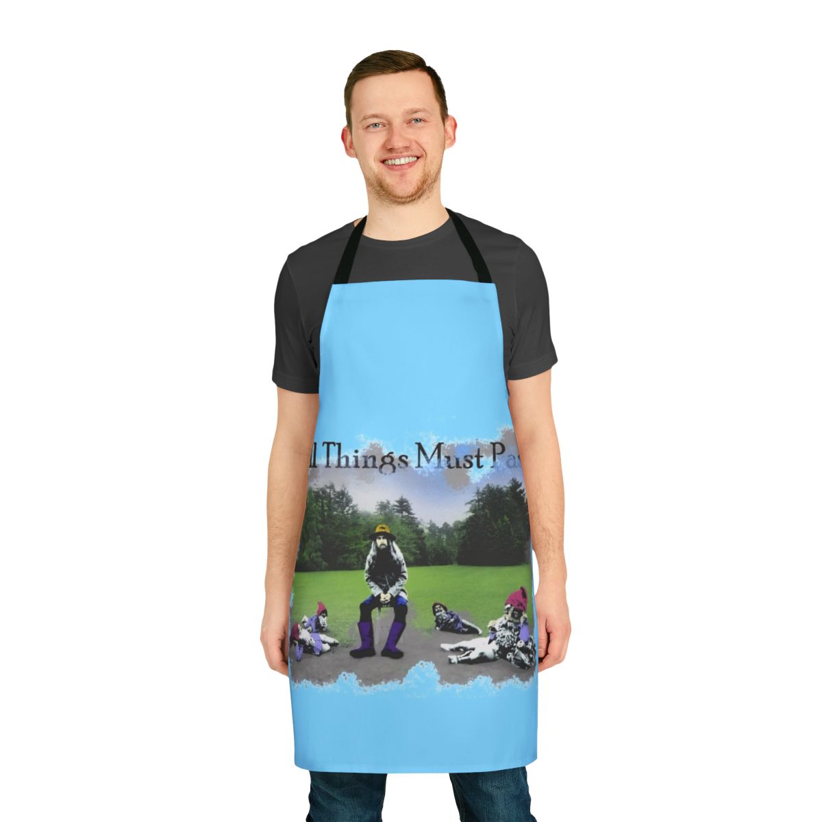 A white apron featuring the iconic album cover for George Harrison's "All Things Must Pass" album.