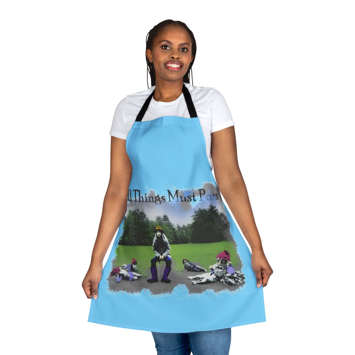 A white apron featuring the iconic album cover for George Harrison's "All Things Must Pass" album.
