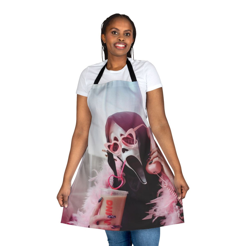 A ghostly black and white apron with the iconic Ghostface mask design, perfect for horror movie fans and home chefs.