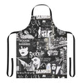 A black and white goth-inspired apron with a collage-style design featuring bats, The Cure, and Siouxie.