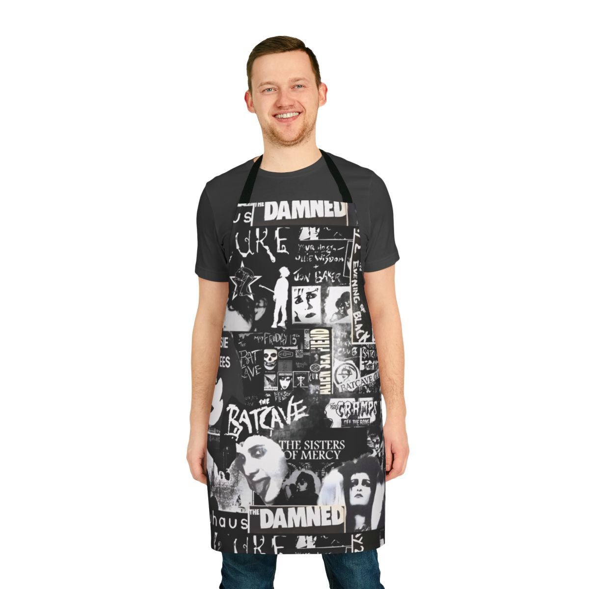 A black and white goth-inspired apron with a collage-style design featuring bats, The Cure, and Siouxie.