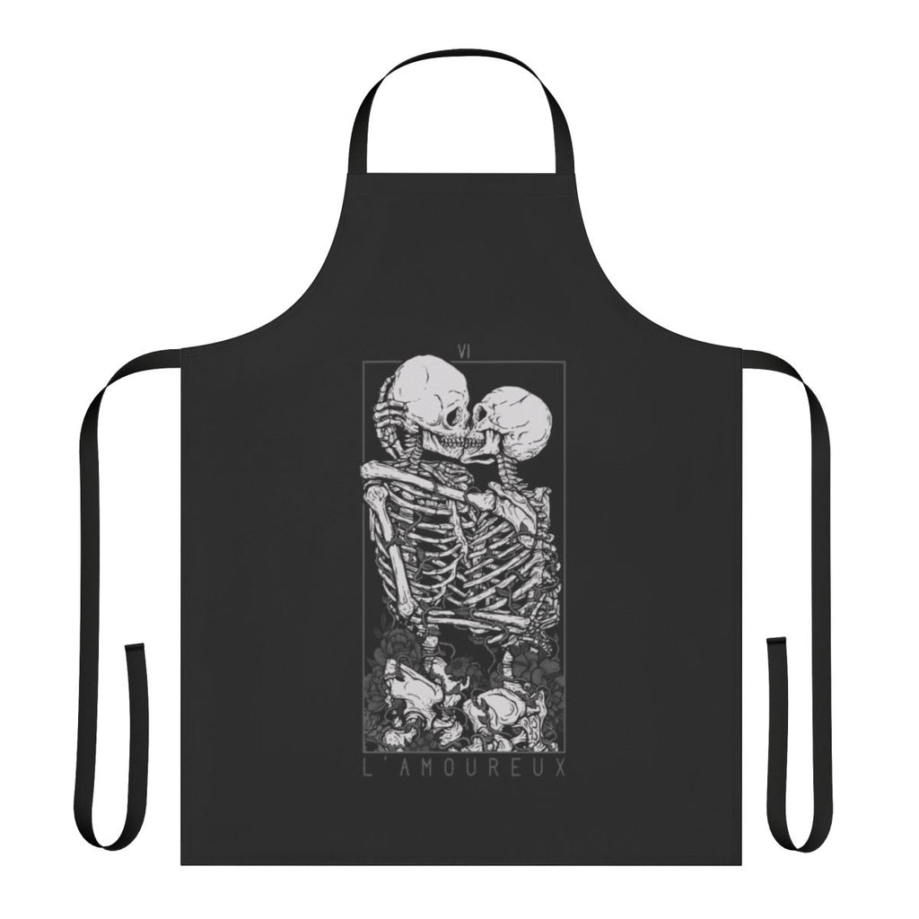 A dark and romantic apron featuring gothic imagery of skulls, flowers, and a couple in embrace.