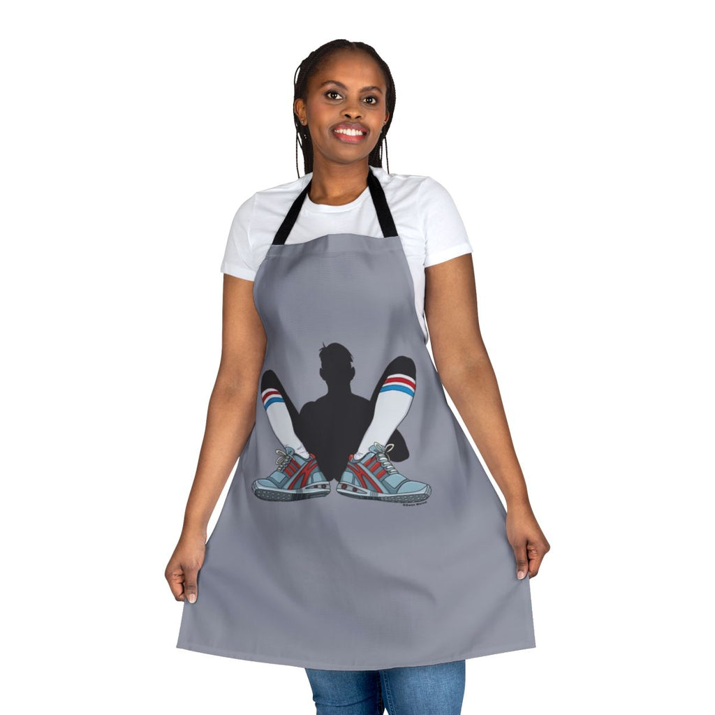 A gray apron designed for active, athletic individuals who enjoy sports and working in the kitchen.