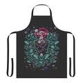 An apron featuring a gremlin-inspired Christmas design with a retro 80s horror movie theme.