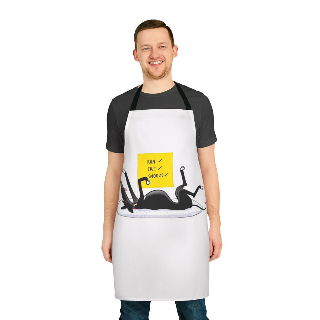 Cartoon illustration of a black greyhound or lurcher dog on a grey and white striped apron