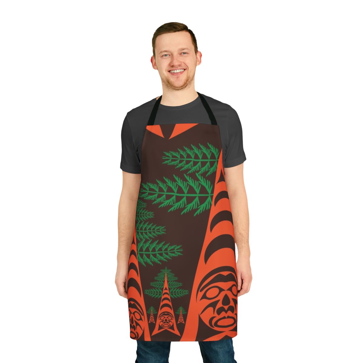 A beautifully crafted apron featuring a cedar forest motif in the style of Coast Salish and First Nations art.