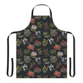 Handcrafted lino print apron featuring vibrant native Australian flowers and foliage.