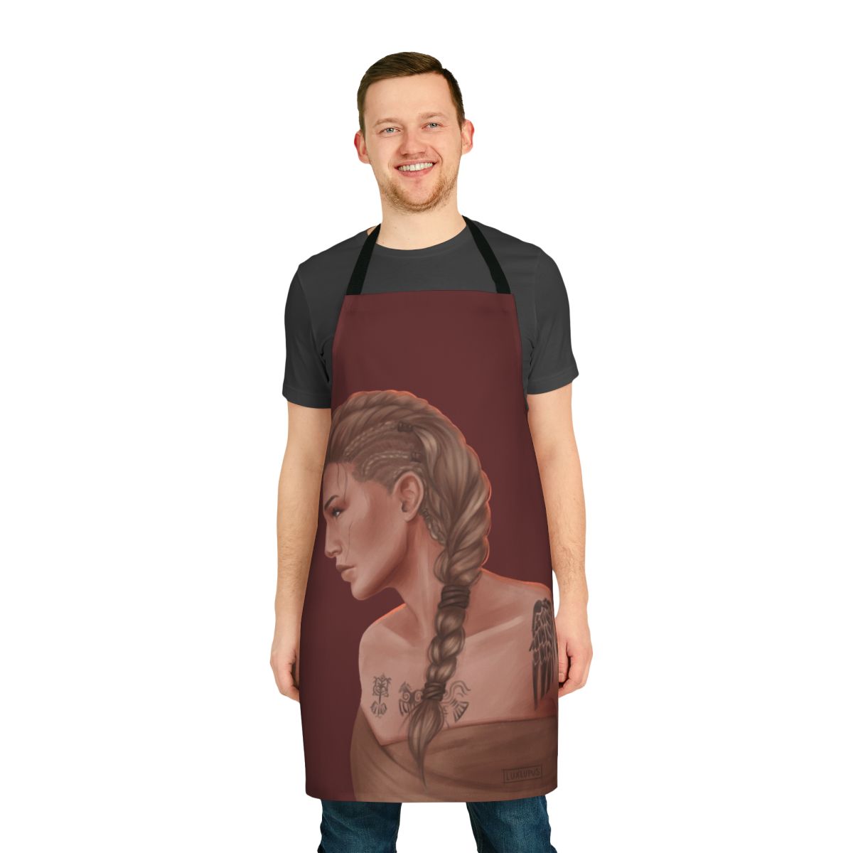 An image of a high-quality, durable apron featuring the Eivor character from the Assassin's Creed Valhalla video game.