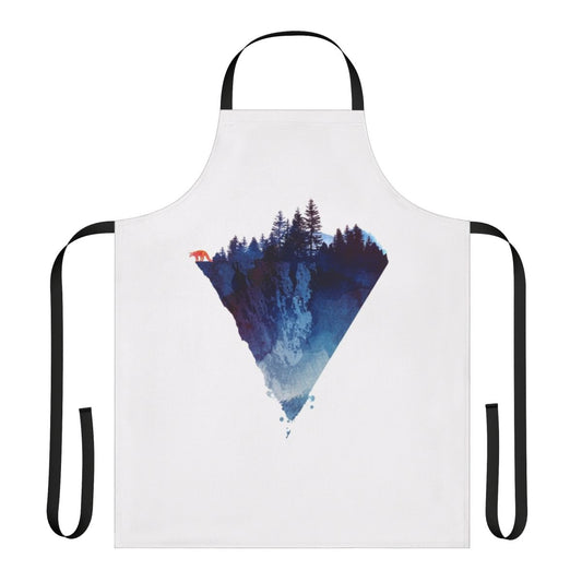 A handmade apron featuring a watercolor painting of a fox in a lush forest setting.