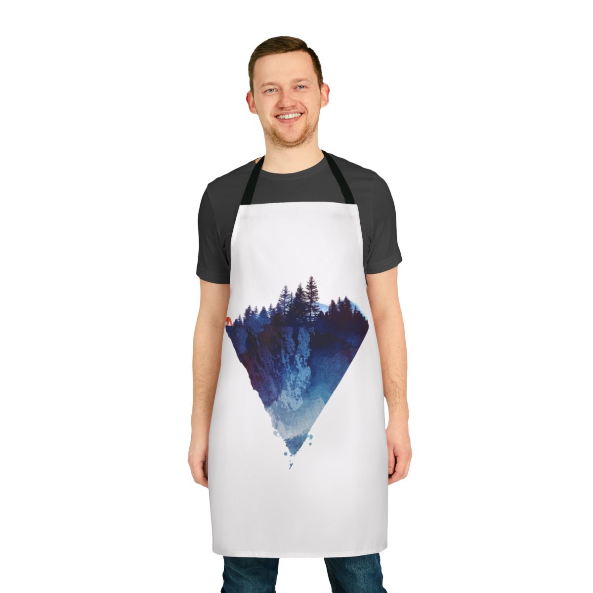 A handmade apron featuring a watercolor painting of a fox in a lush forest setting.