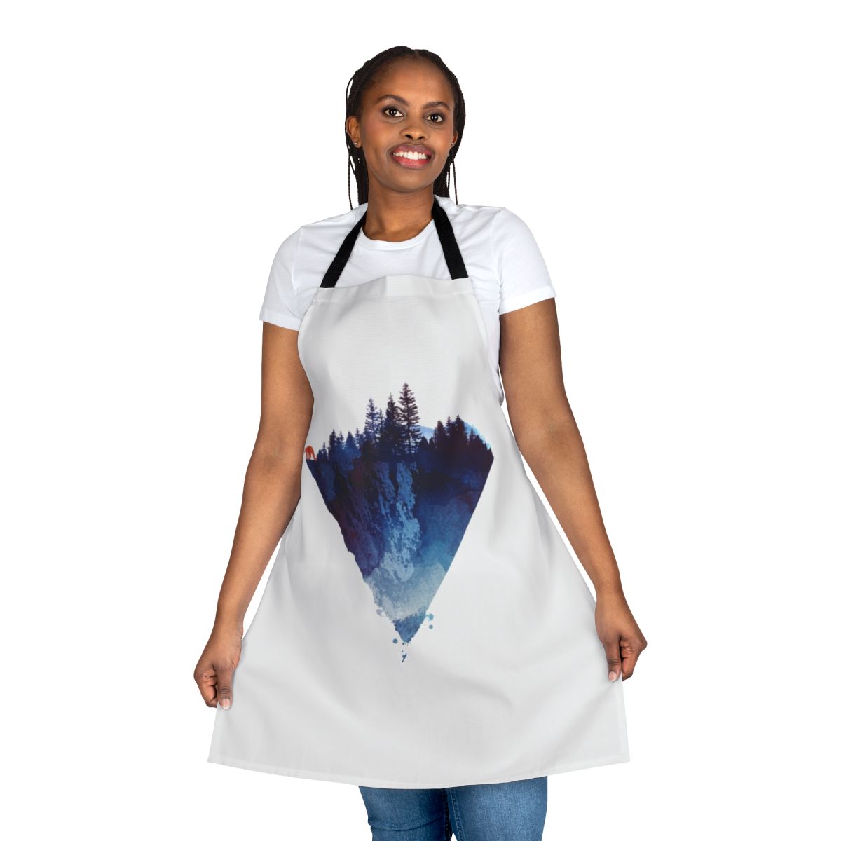 A handmade apron featuring a watercolor painting of a fox in a lush forest setting.