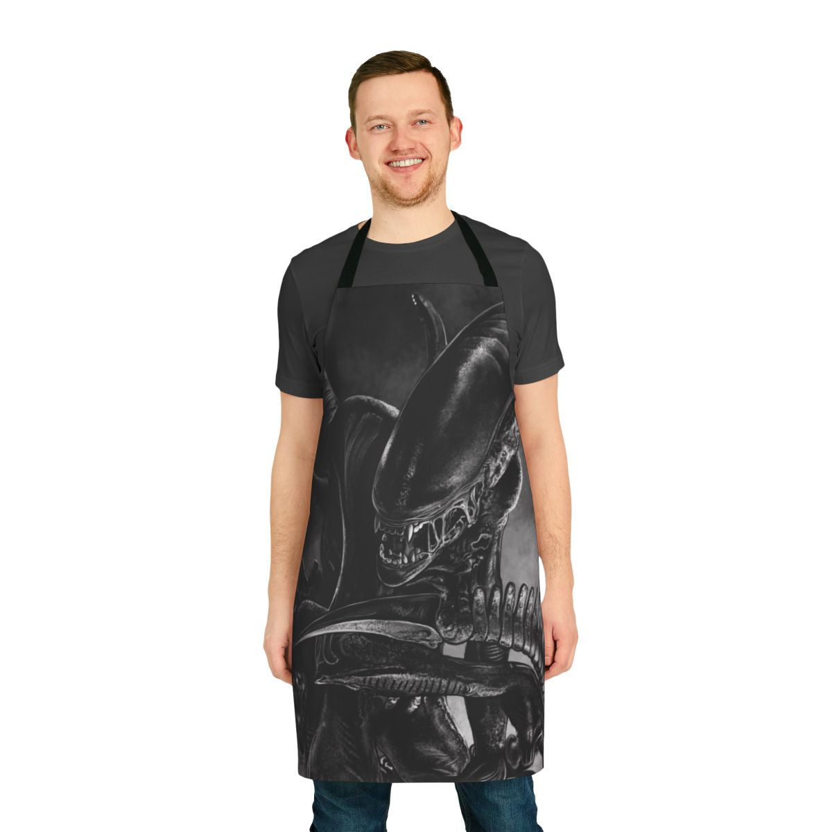 Handmade apron featuring a handdrawn, pessimistic-looking xenomorph alien in a space-themed design