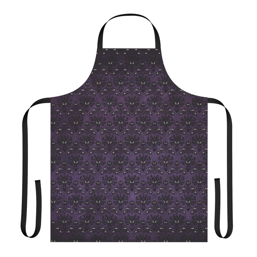 A black and purple apron with a haunted mansion wallpaper design, perfect for spooky kitchen tasks.