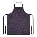 A black and purple apron with a haunted mansion wallpaper design, perfect for spooky kitchen tasks.