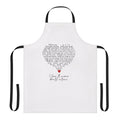 An apron featuring a love heart design in the iconic Liverpool FC colors, perfect for football fans.