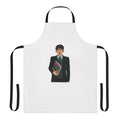 A white apron featuring the characters from the Netflix series Heartstopper, including Charlie Spring.