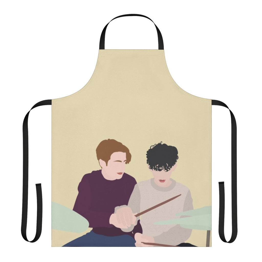 Heartstopper-themed apron featuring illustrations of Nick and Charlie playing drums