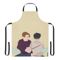 Heartstopper-themed apron featuring illustrations of Nick and Charlie playing drums