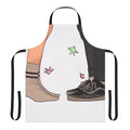 Heartstopper-themed apron featuring the characters Nick Nelson and Charlie Spring