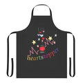 A colorful apron featuring the Heartstopper leaves and rainbow design, perfect for Valentine's Day and celebrating bisexual pride.