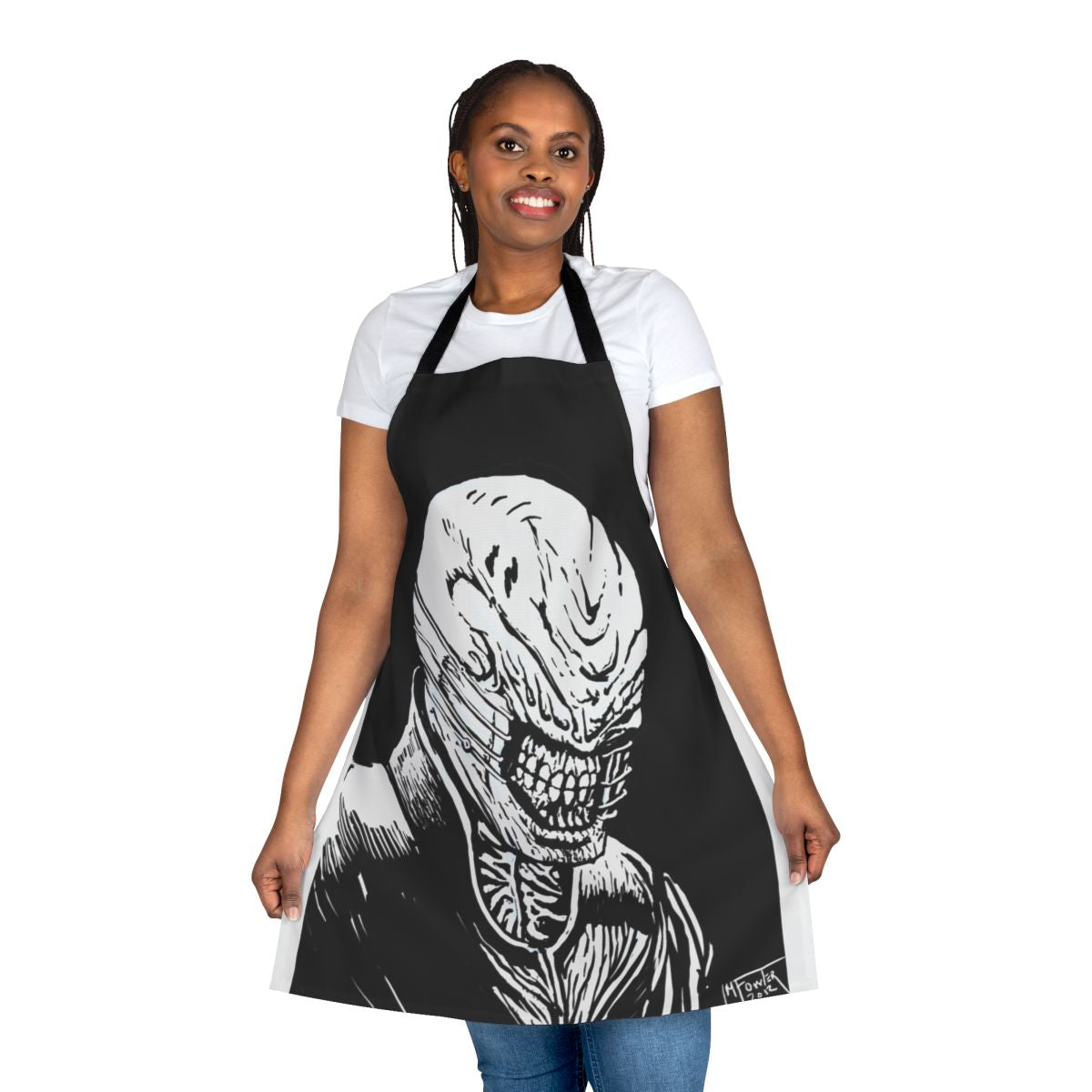 A dark and sinister-looking kitchen apron with the iconic Chatterer Cenobite face from the Hellraiser horror franchise.