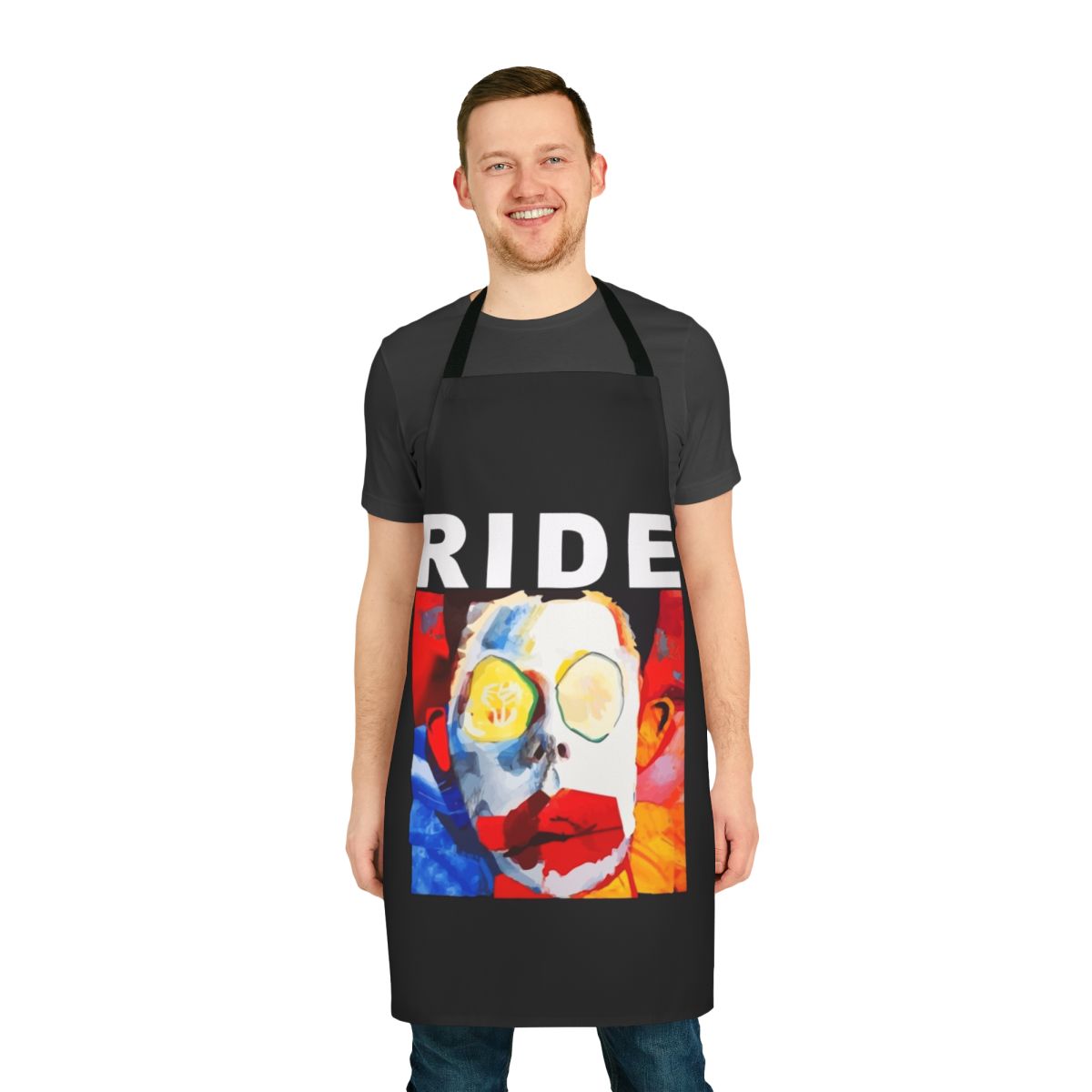 Vibrant, colorful apron featuring a quirky, unsettling "ugly ride" face design