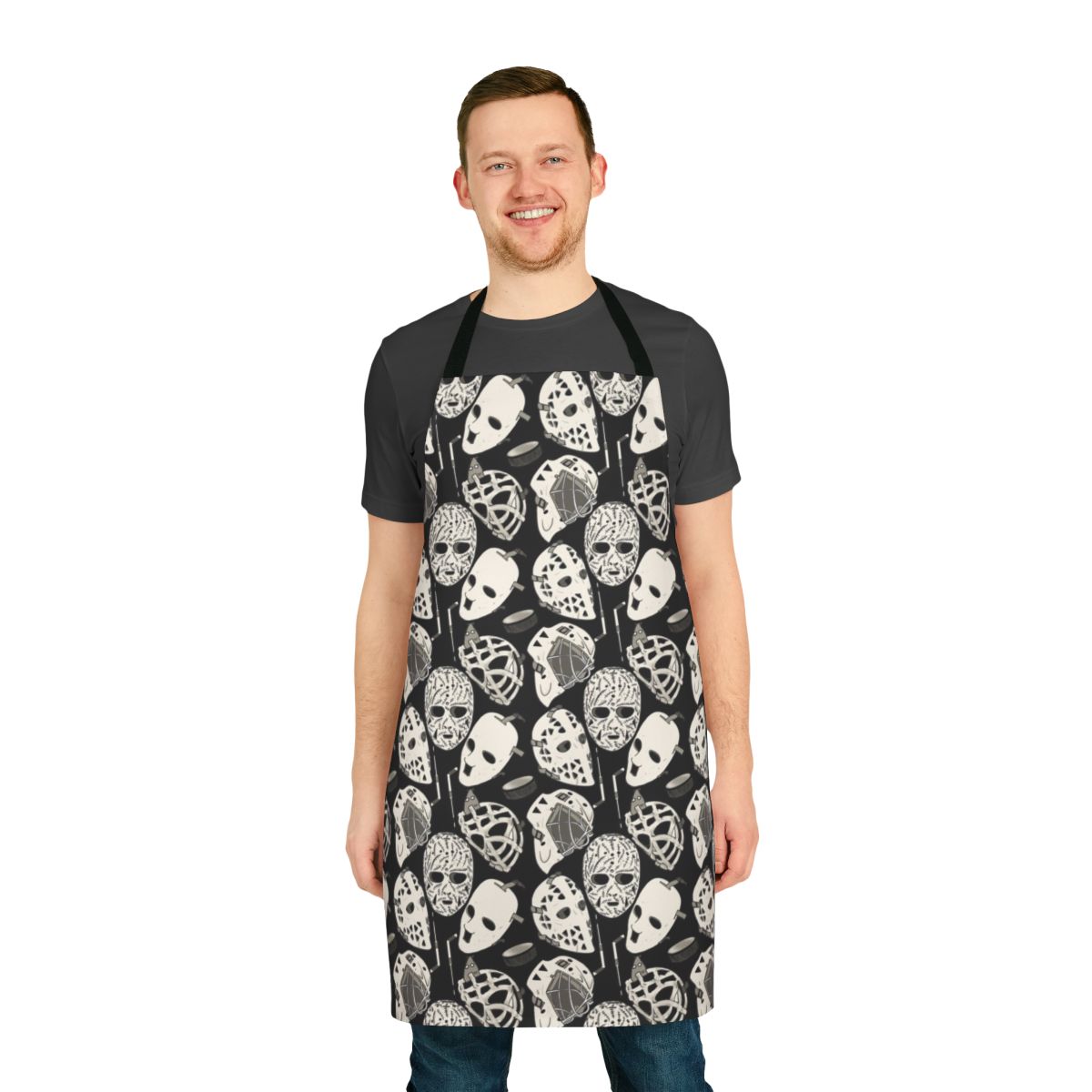 Hockey goalie-inspired beige leather apron with puck and stick design
