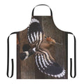 Hoopoe bird in flight on a black and orange apron