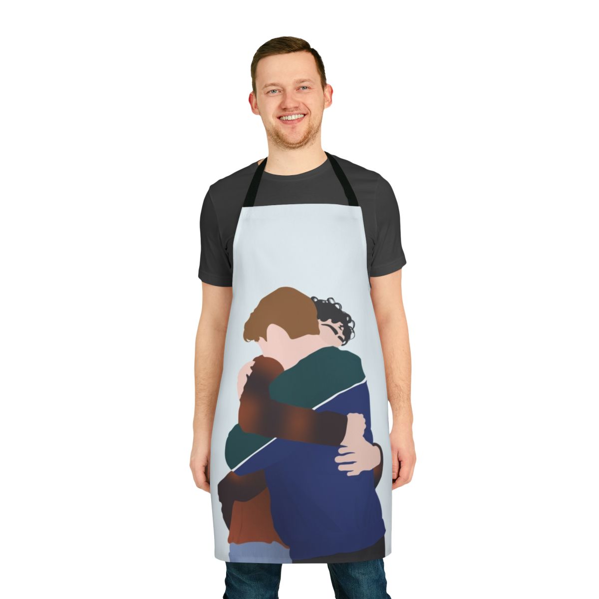 A custom apron featuring a graphic of Charlie Spring and Nick Nelson from the Netflix series Heartstopper hugging.
