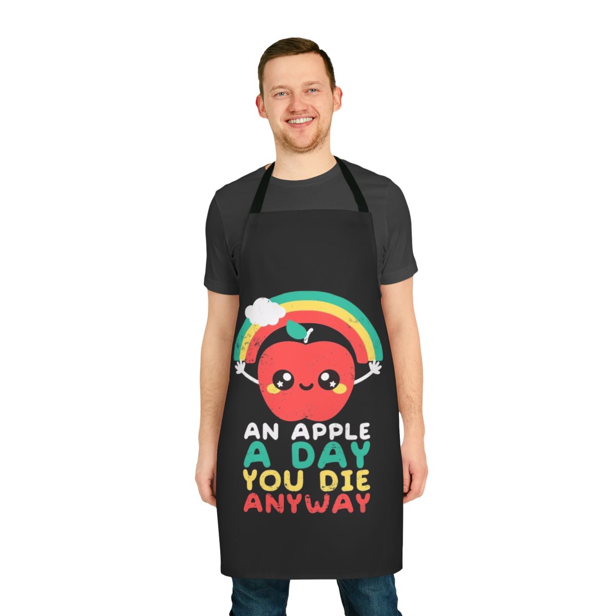Apron with a stylized rainbow apple design and a sarcastic "An Apple A Day You Die Anyway" message.